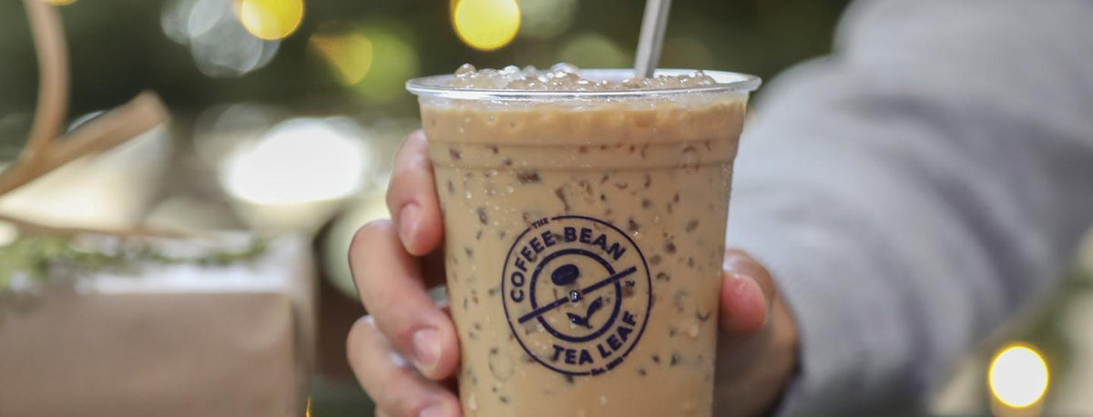 Person Holding Iced Coffee